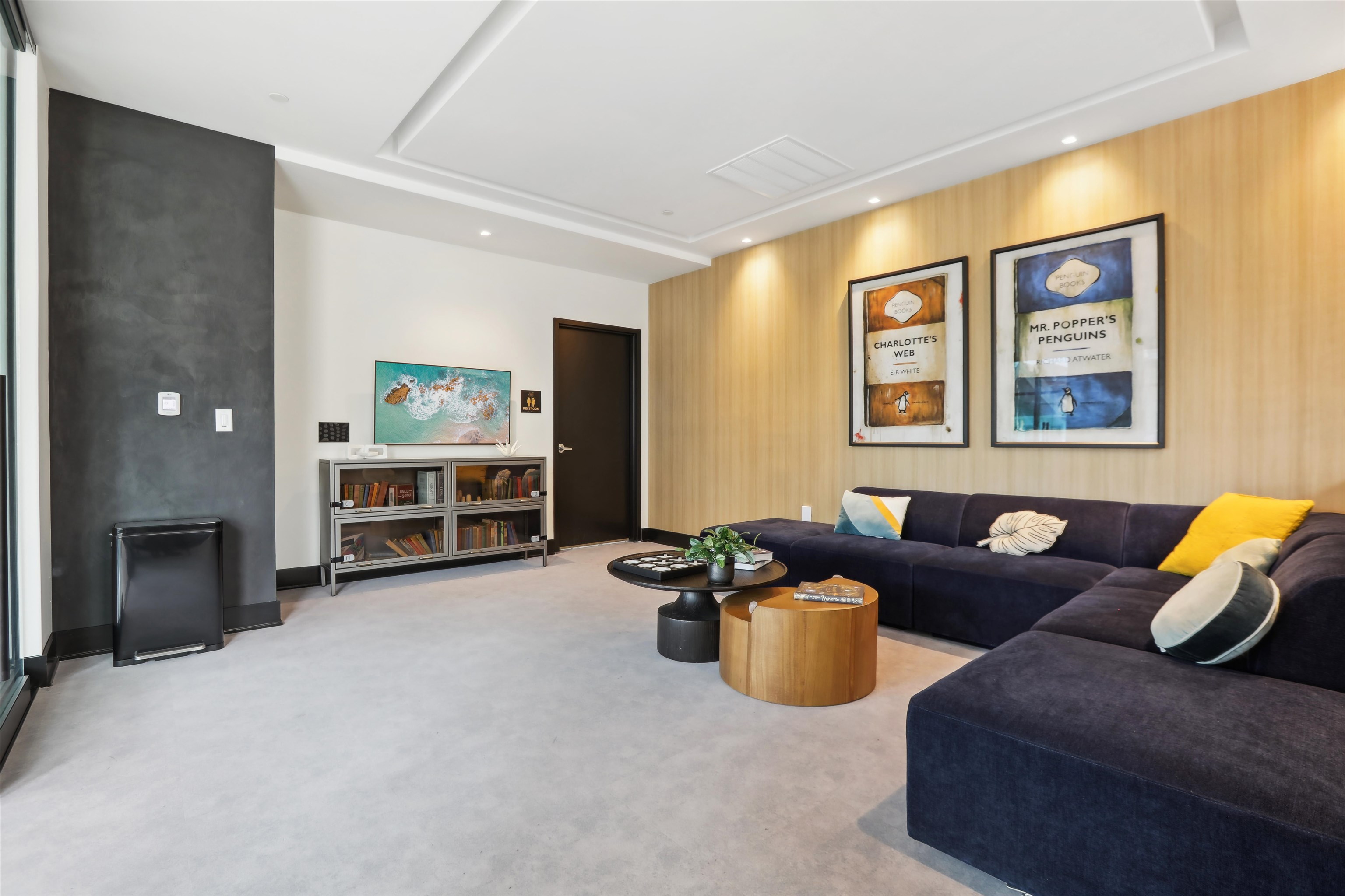32 Oakland Avenue, Unit 1504 Jersey City, NJ 07306 - Photo 27 of 50 a living room with furniture and a flat screen tv