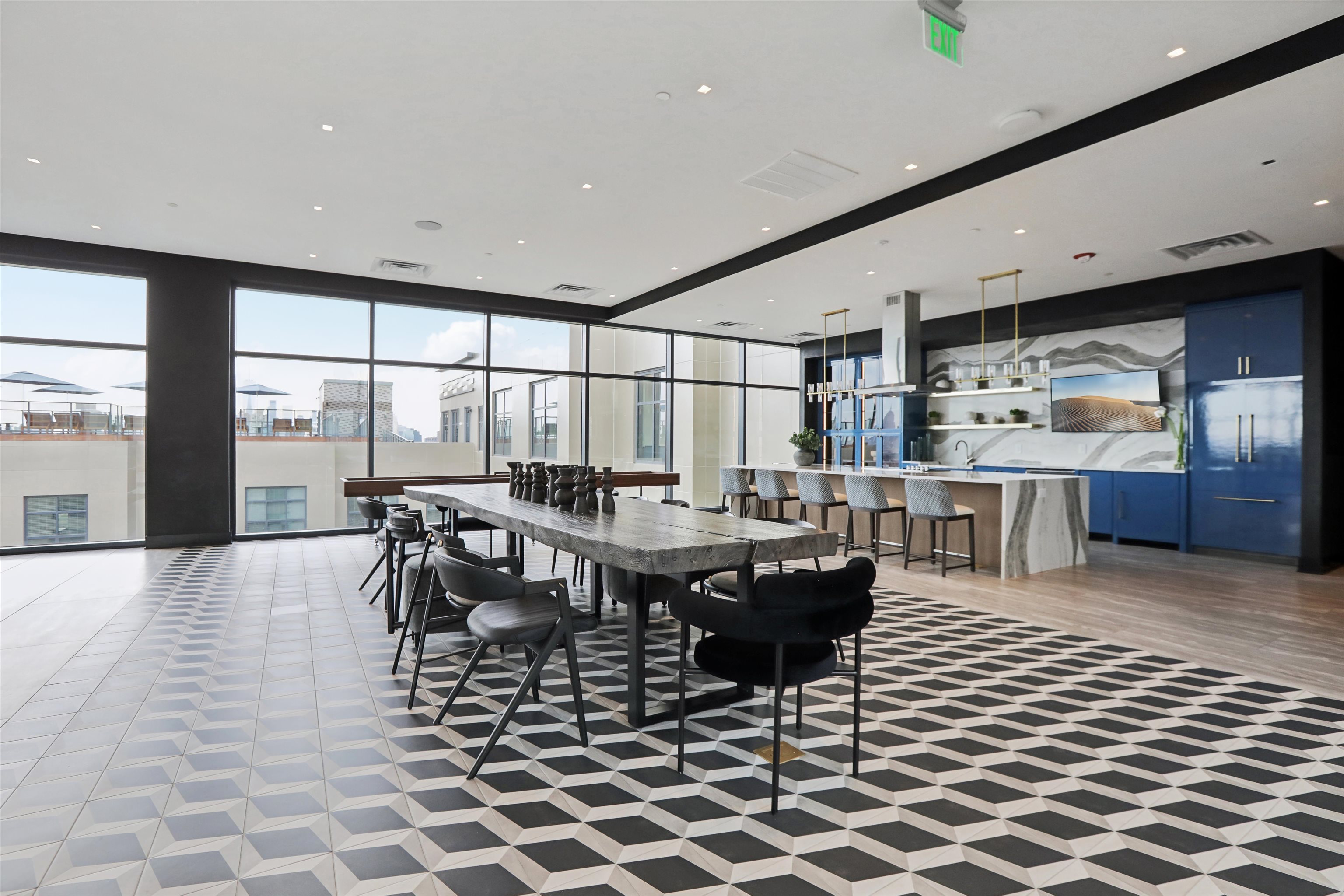 32 Oakland Avenue, Unit 1504 Jersey City, NJ 07306 - Photo 31 of 50 a dining hall with stainless steel appliances a rug table and chairs