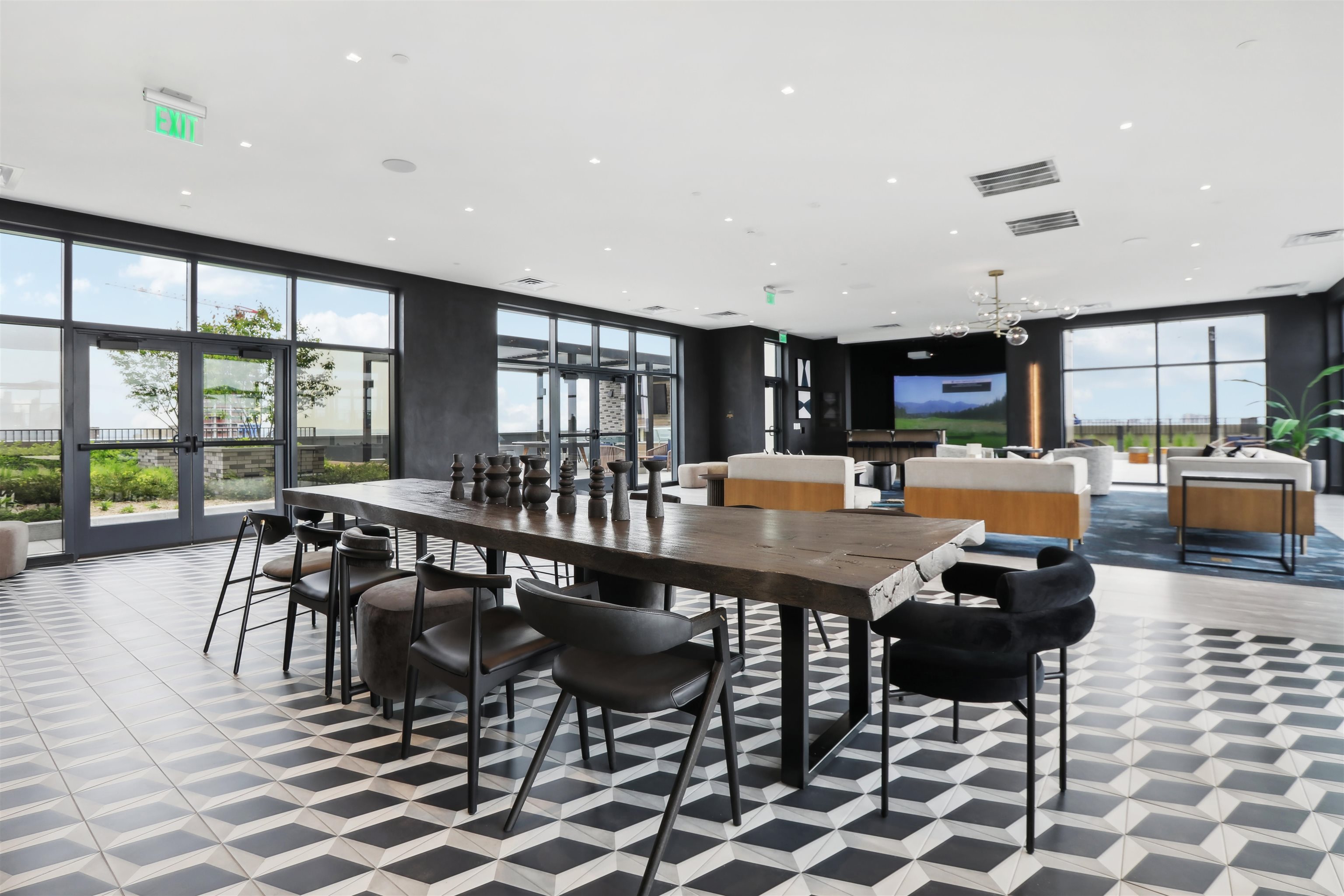 32 Oakland Avenue, Unit 1504 Jersey City, NJ 07306 - Photo 36 of 50 a room with lots of chairs and mirrors