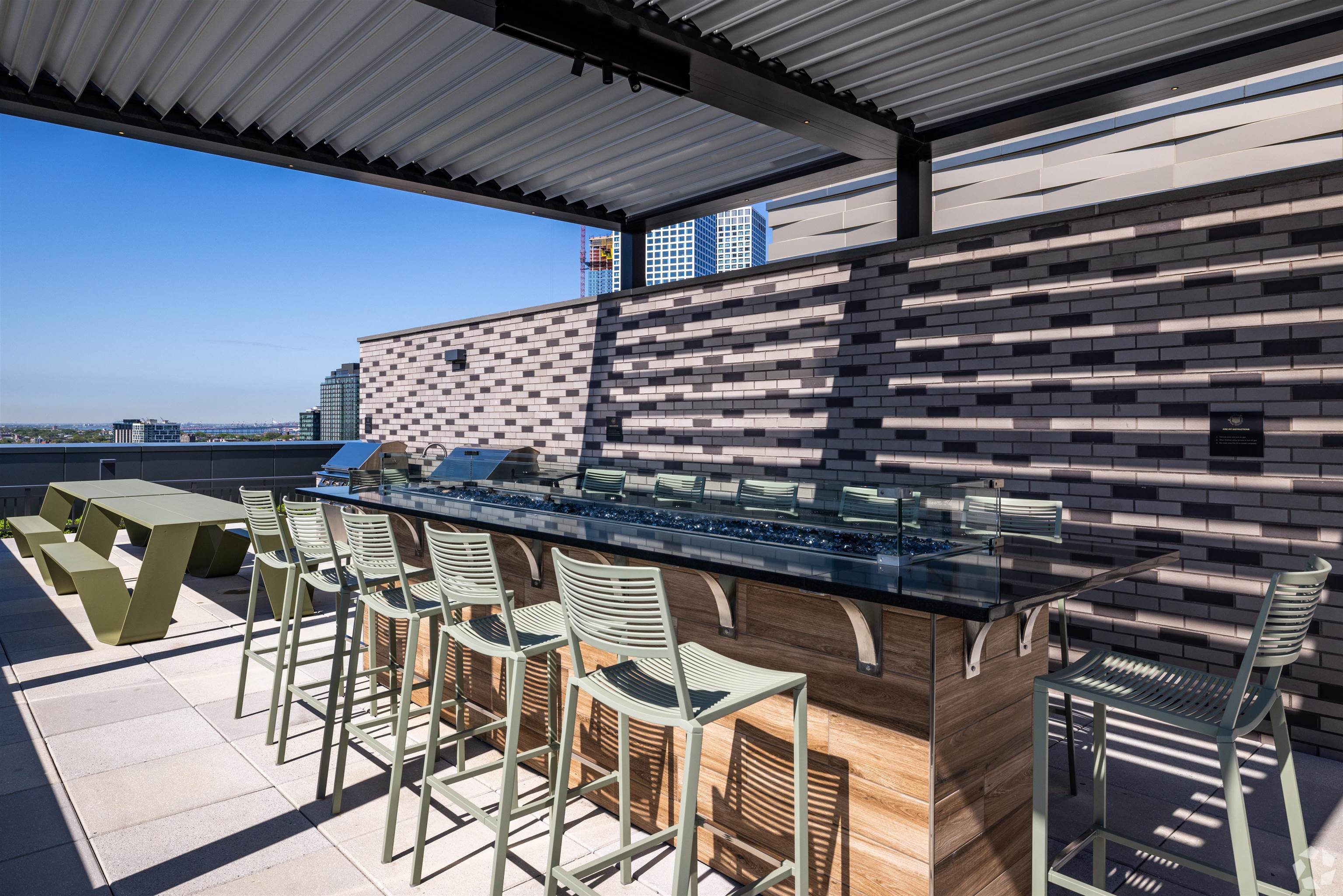 32 Oakland Avenue, Unit 1504 Jersey City, NJ 07306 - Photo 45 of 50 a view of balcony with chairs