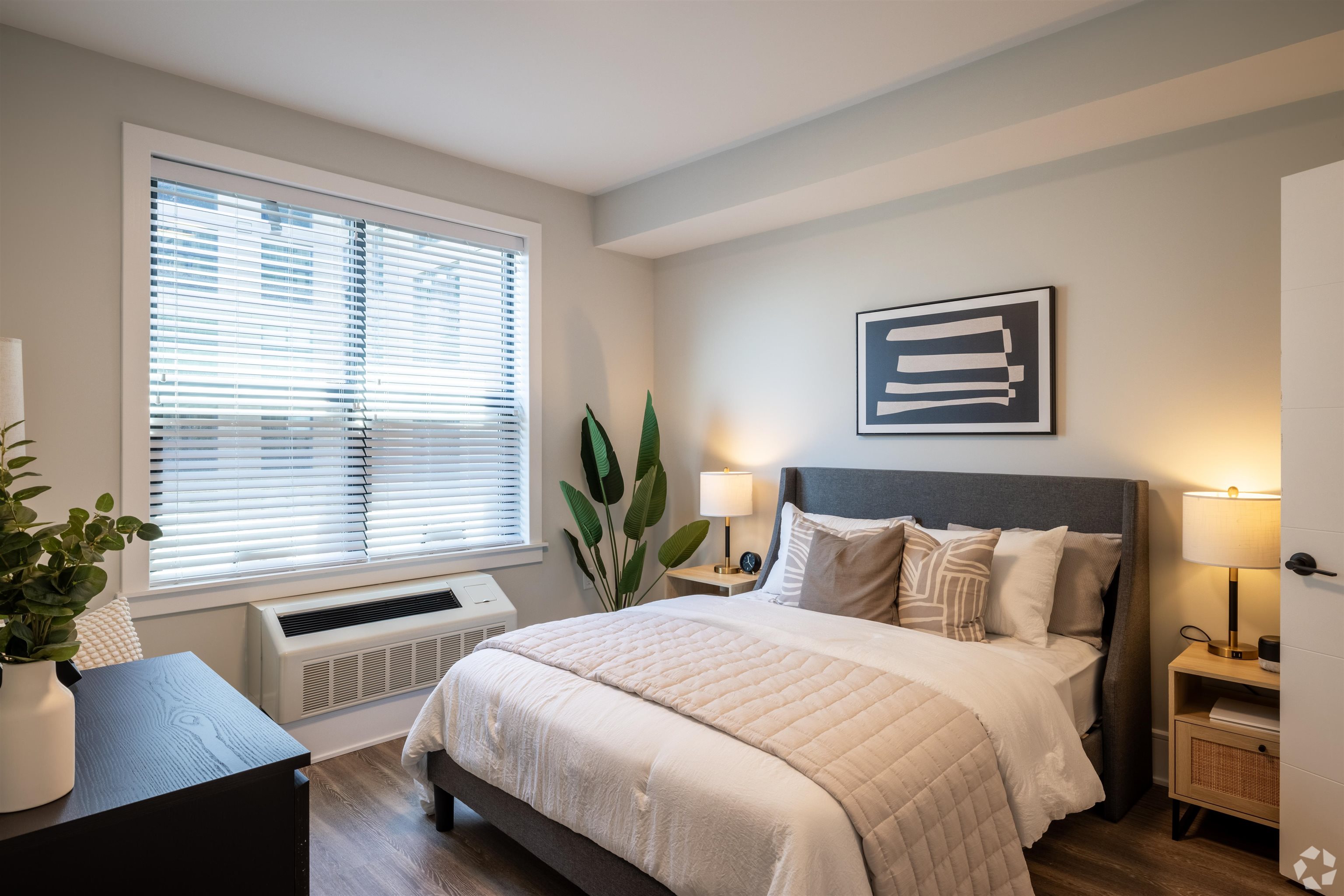 32 Oakland Avenue, Unit 1504 Jersey City, NJ 07306 - Photo 50 of 50 a bedroom with a large bed and a window