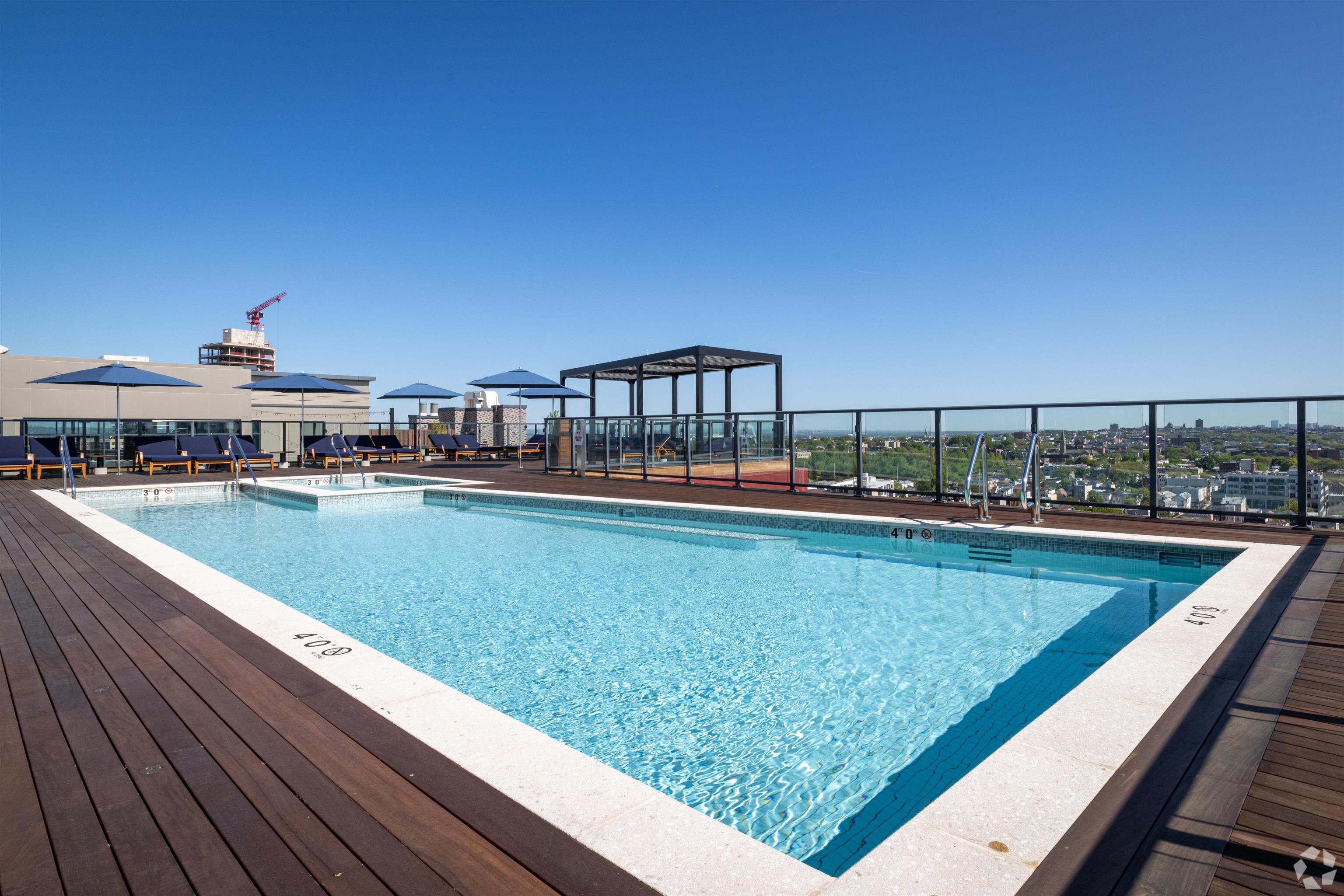 32 Oakland Avenue, Unit 1504 Jersey City, NJ 07306 - Photo 6 of 50 a view of swimming pool with outdoor seating