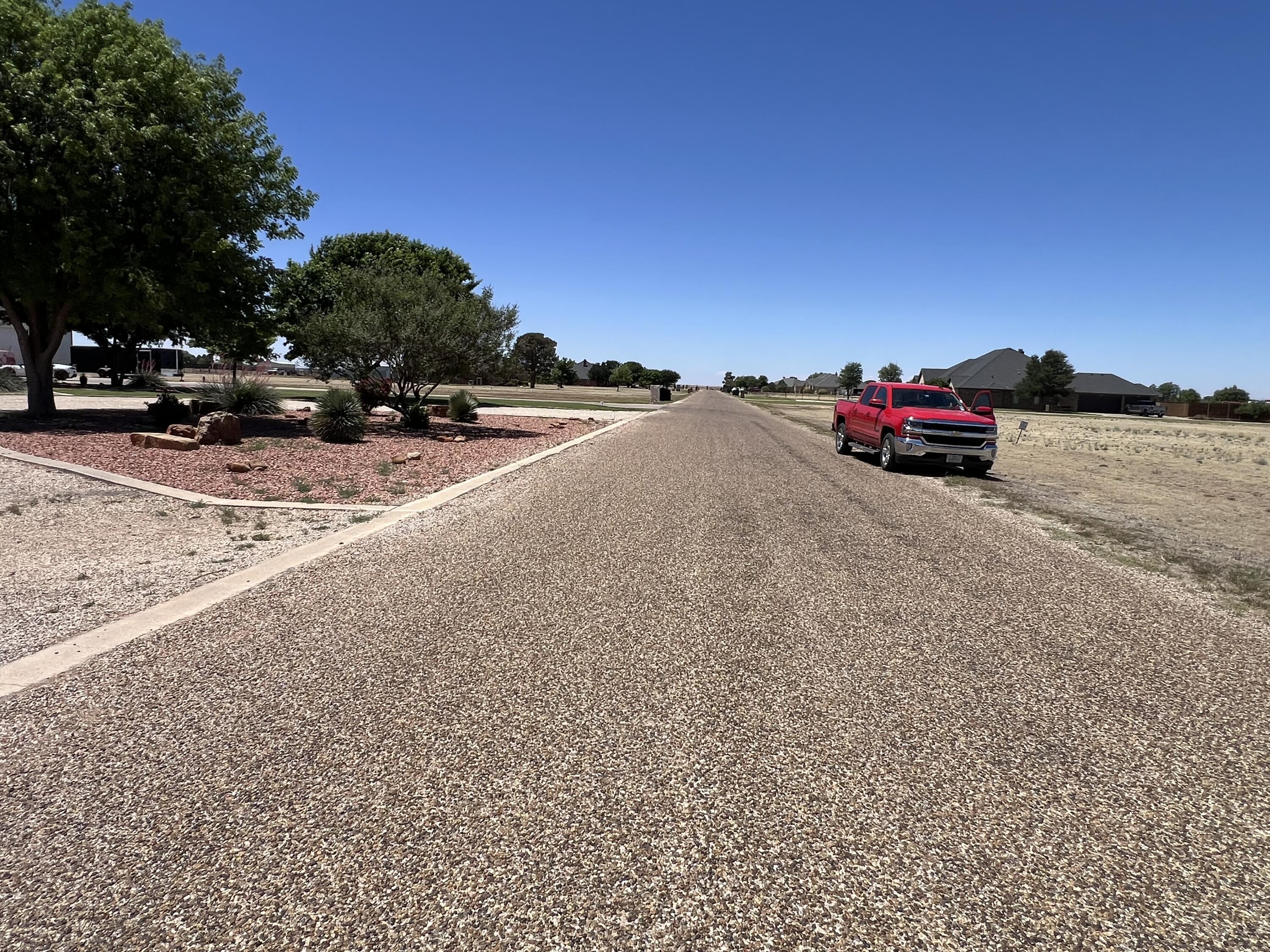 5402 C R 7920 Lubbock, TX 79424 - Photo 6 of 7 a view of street with parked cars