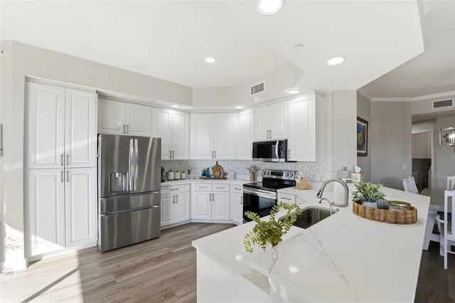 a view of a balcony with floor to ceiling window and wooden floor