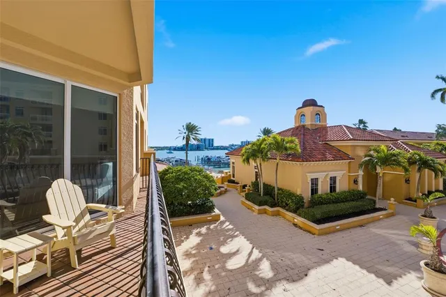 a view of a building with outdoor seating