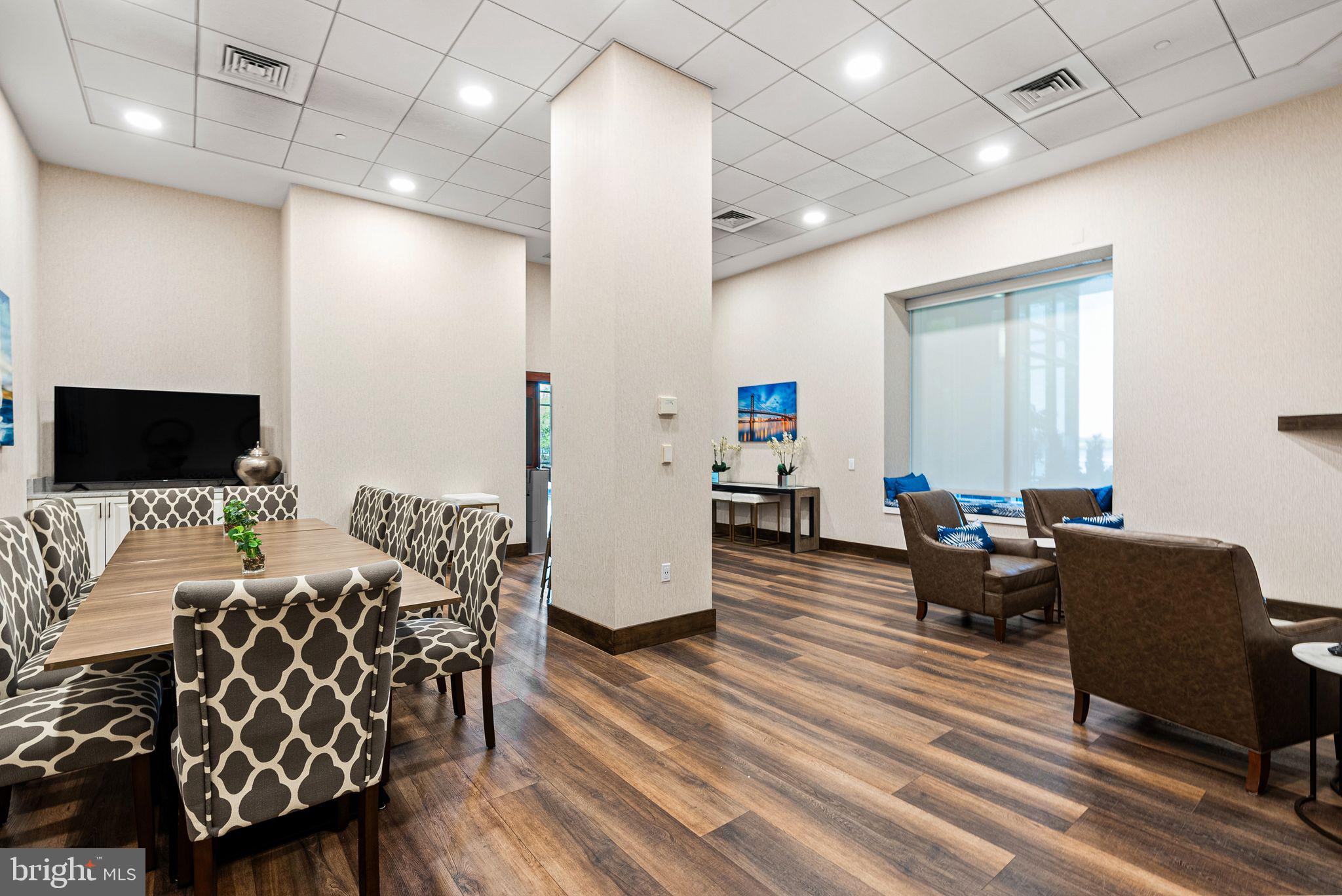 901 North Penn Street, Unit R704 Philadelphia, PA 19123 - Photo 24 of 41 a living room with furniture and a flat screen tv