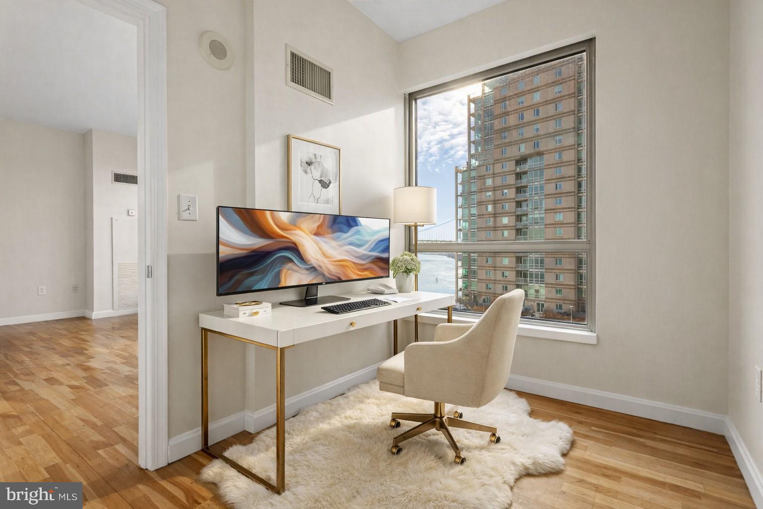 901 North Penn Street, Unit R704 Philadelphia, PA 19123 - Photo 8 of 41 a workspace with furniture and a window