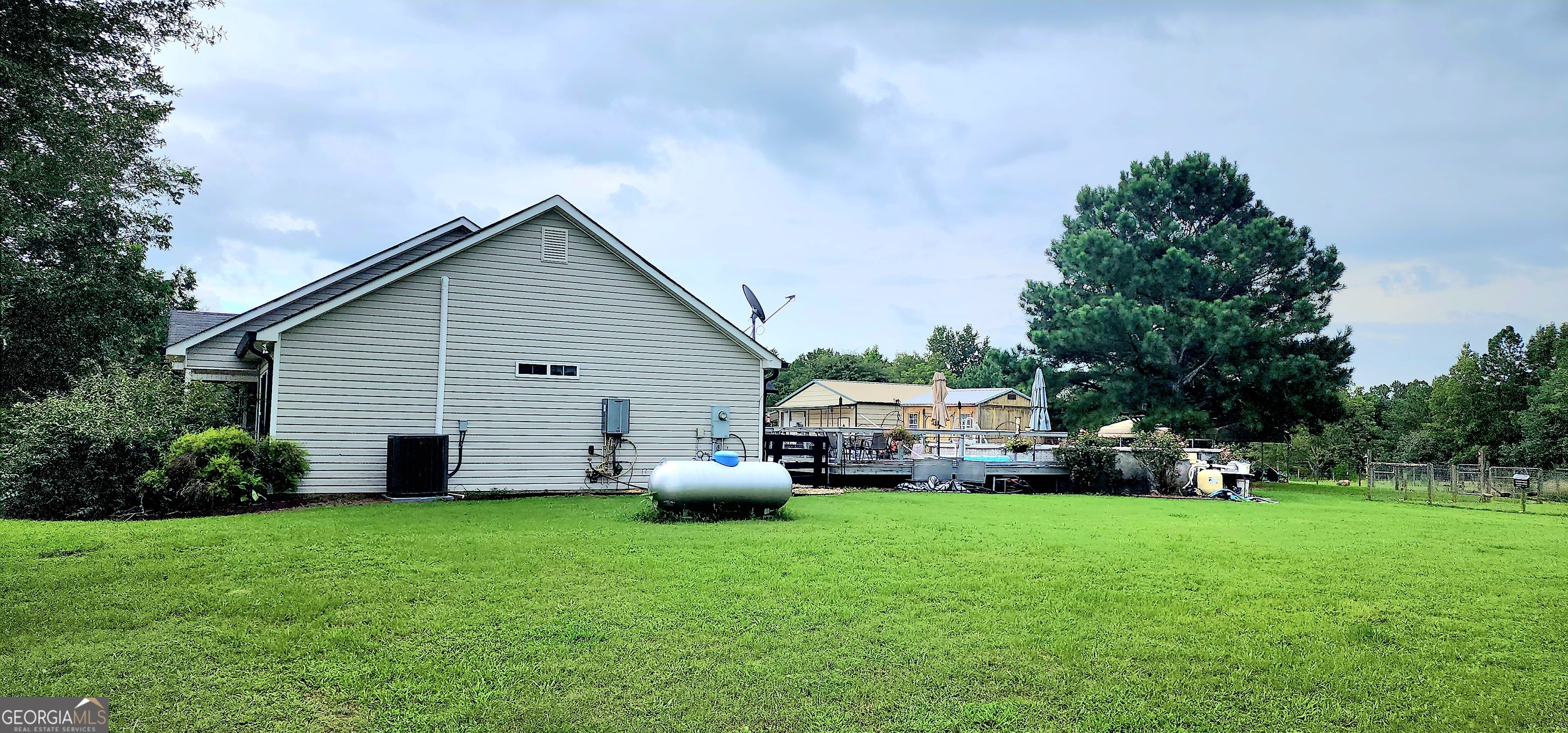 1579 Bates Road Concord, GA 30206 - Photo 12 of 52 a view of a house with backyard