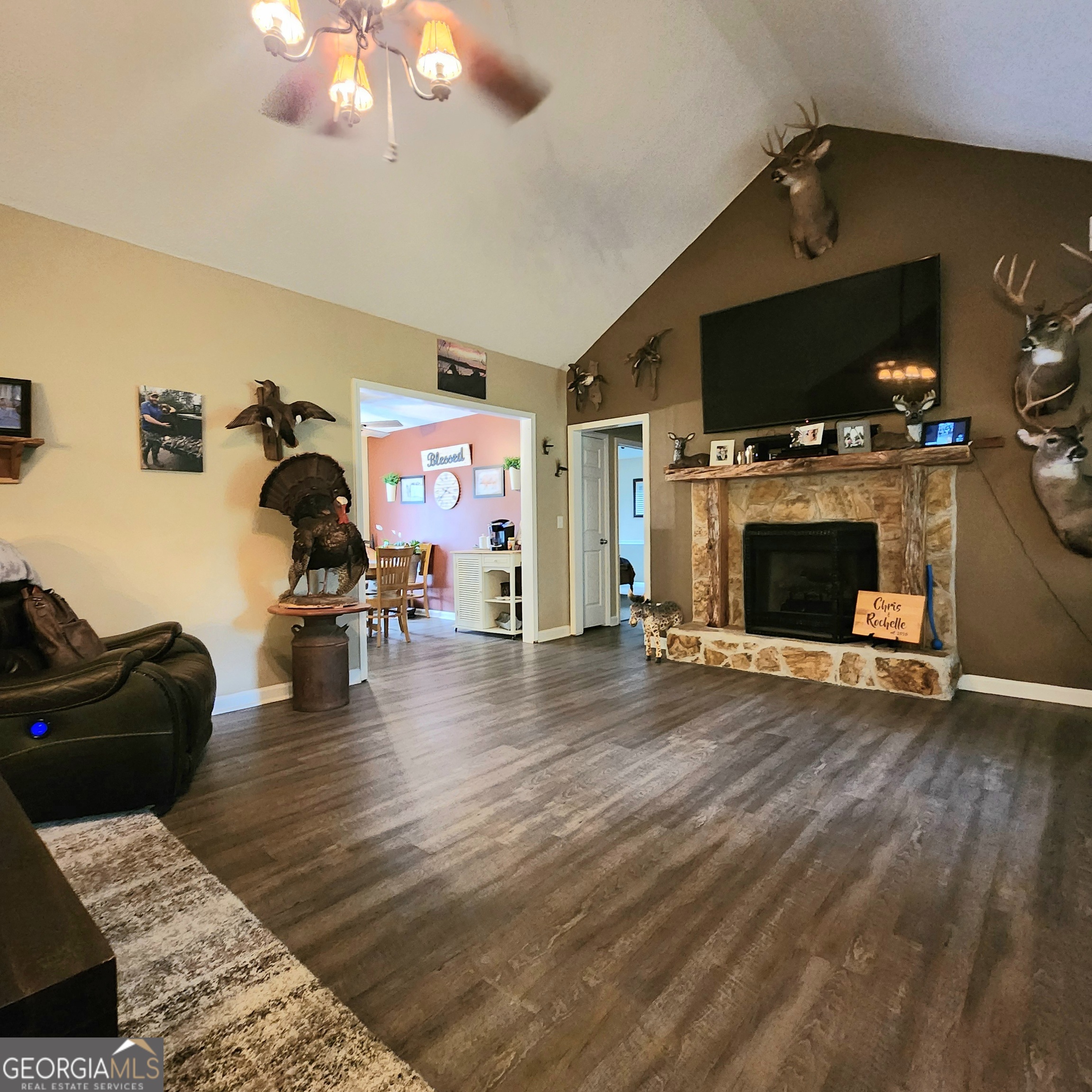 1579 Bates Road Concord, GA 30206 - Photo 25 of 52 a living room with furniture and a flat screen tv