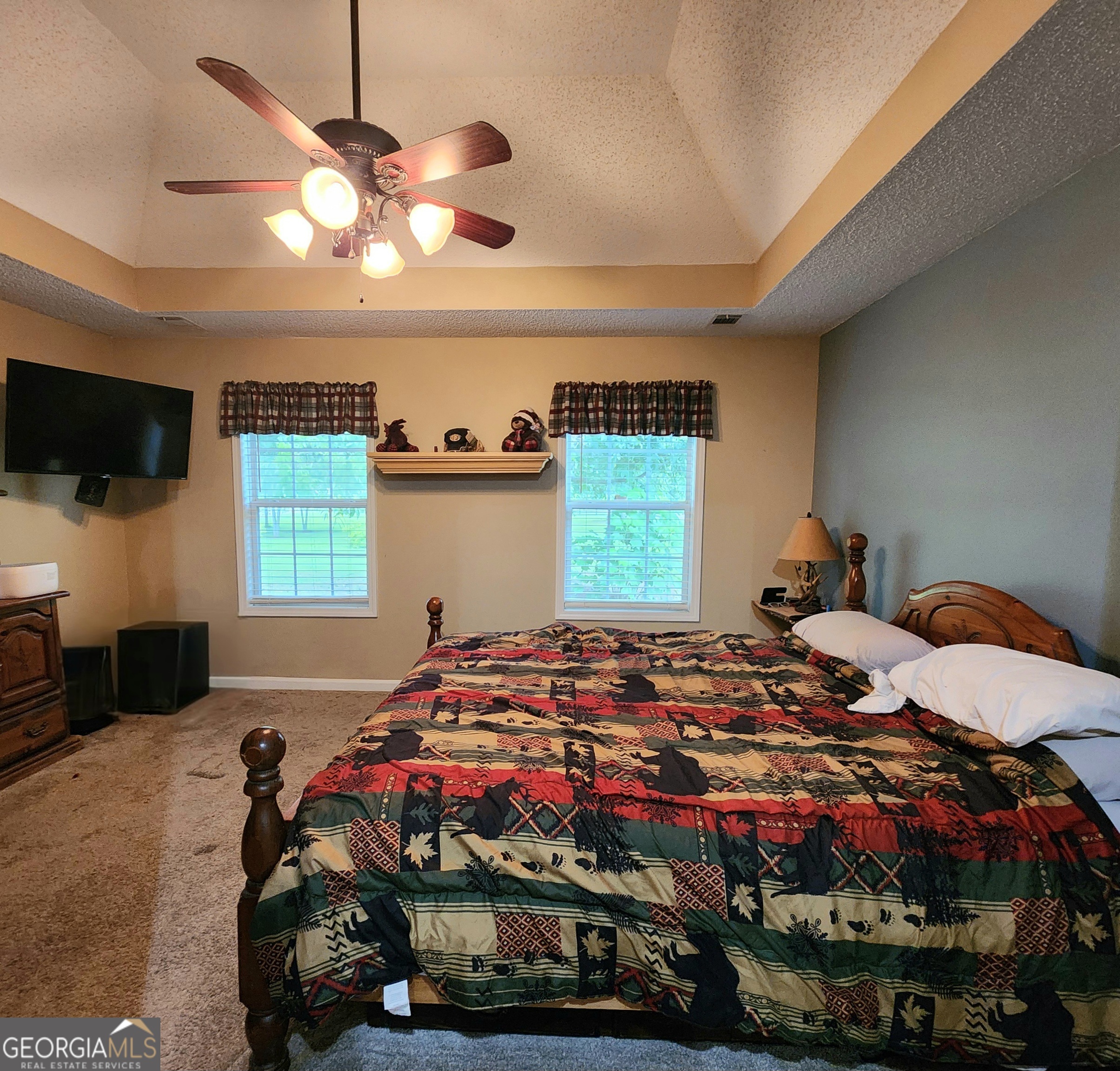 1579 Bates Road Concord, GA 30206 - Photo 28 of 52 a bedroom with a bed and a window