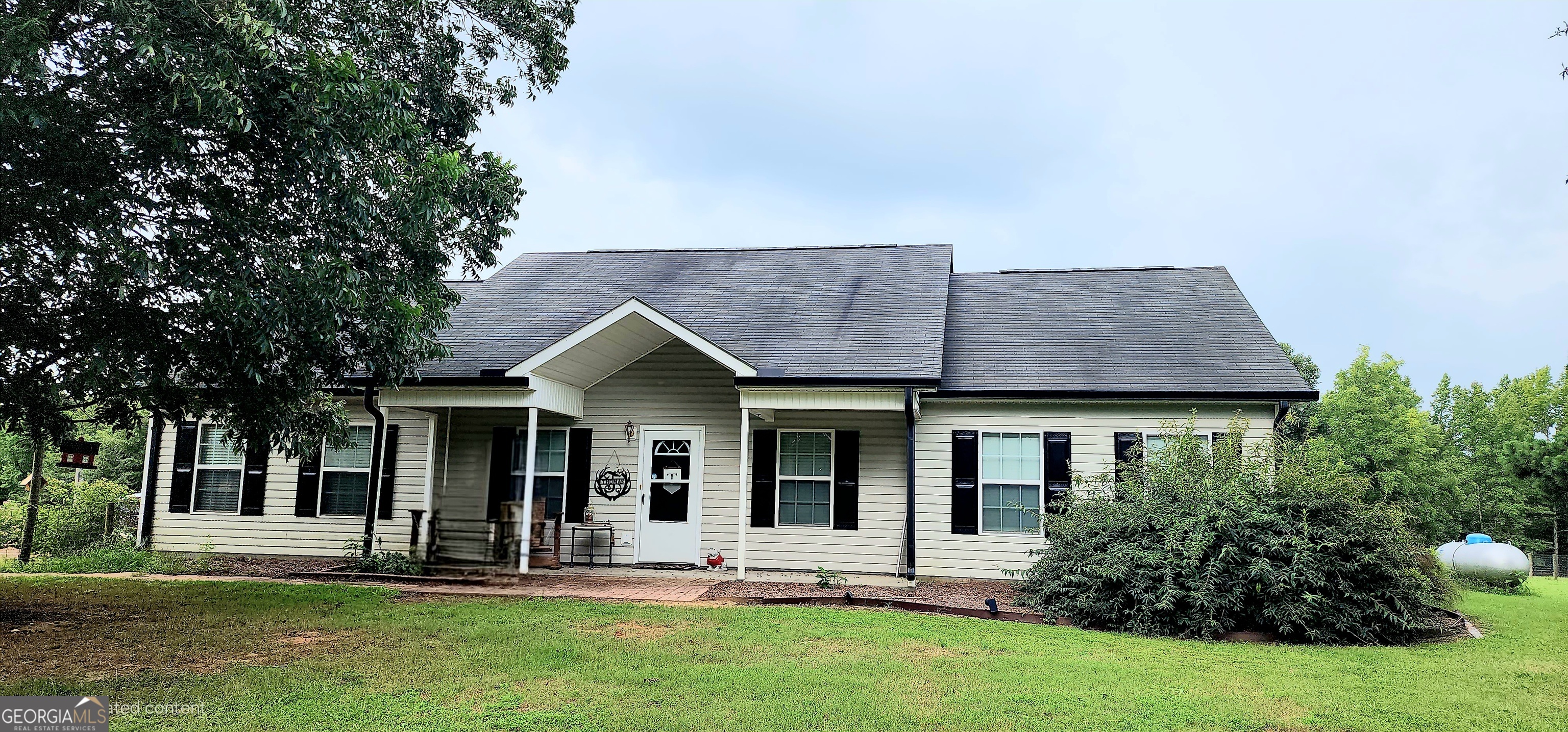 1579 Bates Road Concord, GA 30206 - Photo 3 of 52 front view of a house with a yard