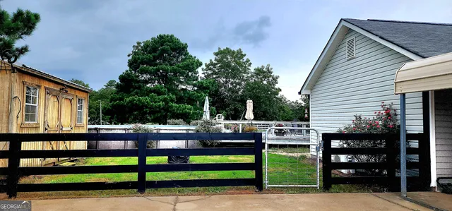 a view of a street with sitting area
