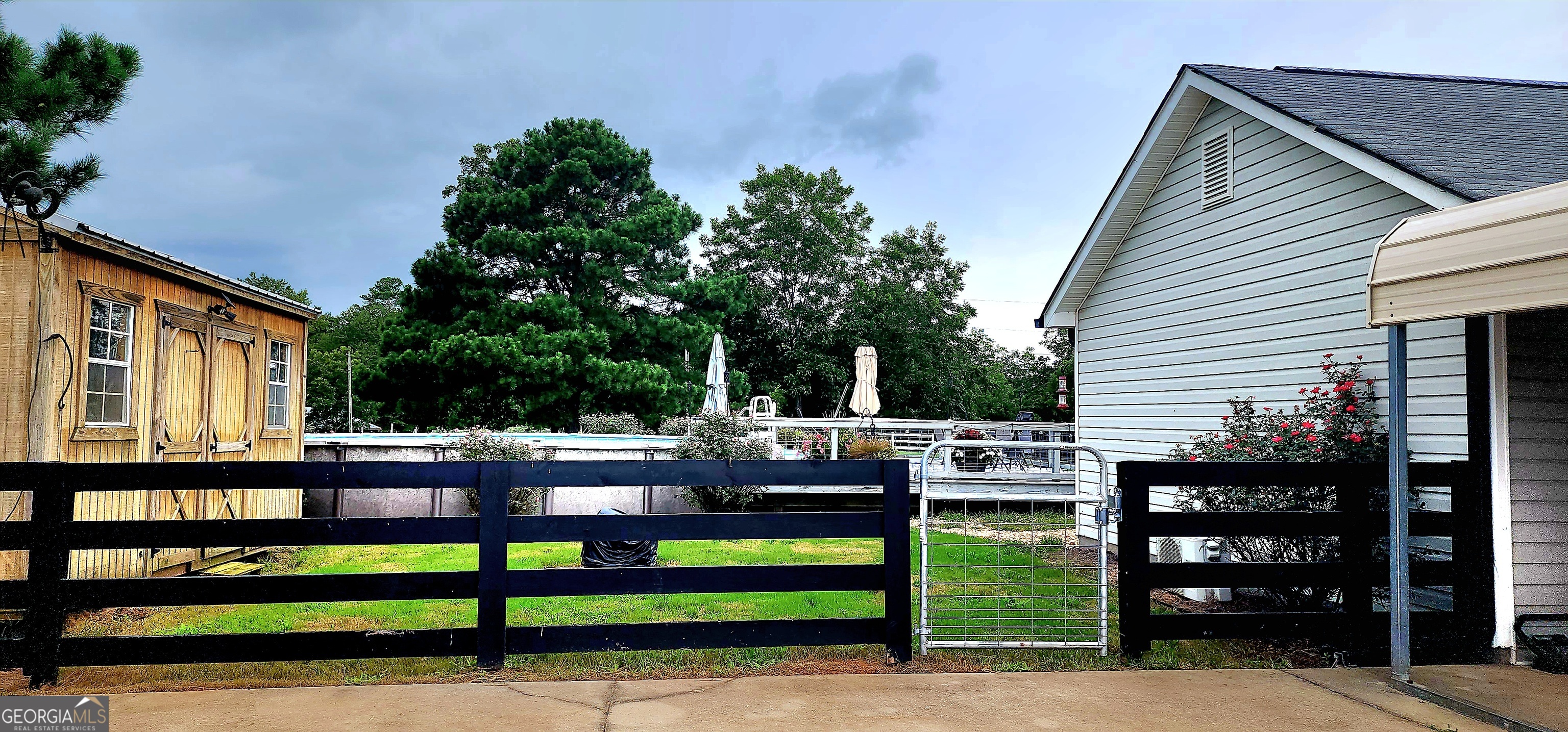 1579 Bates Road Concord, GA 30206 - Photo 4 of 52 a view of a street with sitting area