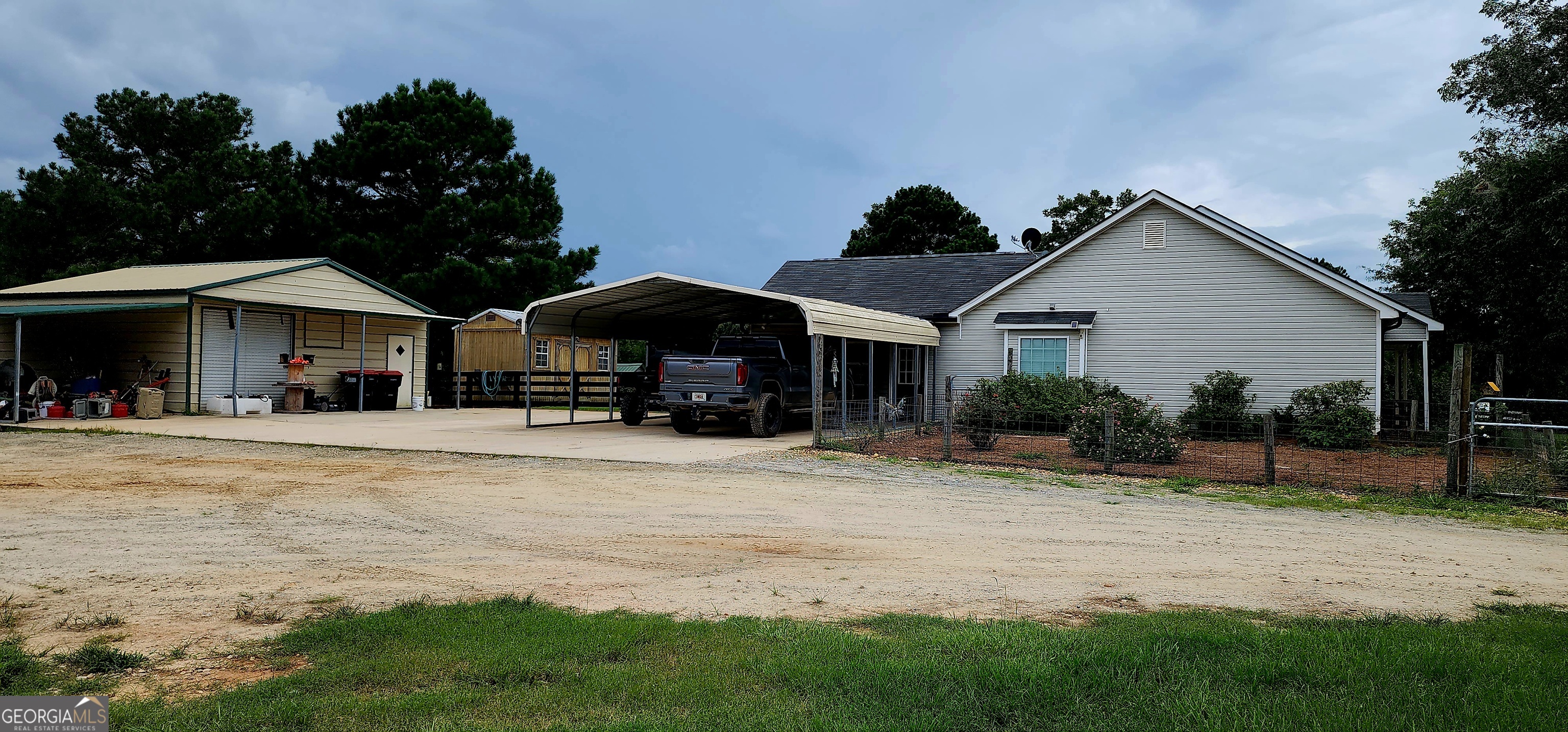 1579 Bates Road Concord, GA 30206 - Photo 46 of 52 a front view of a house with a yard and porch