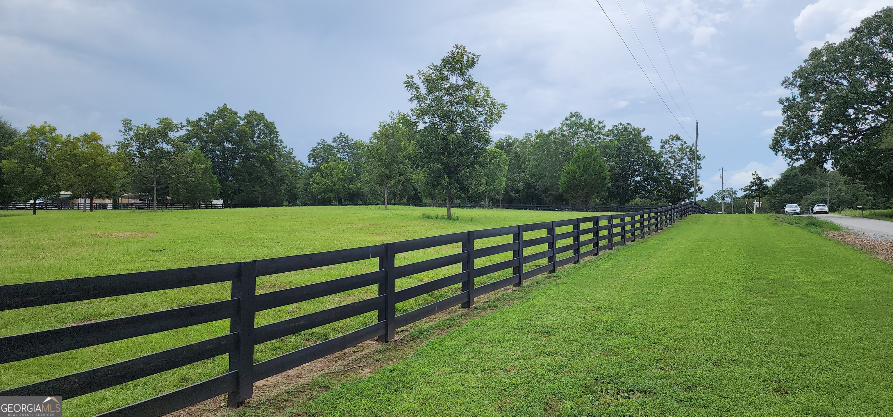 1579 Bates Road Concord, GA 30206 - Photo 50 of 52 a view of a field with grass and a small yard