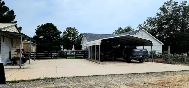 a view of house with a outdoor space