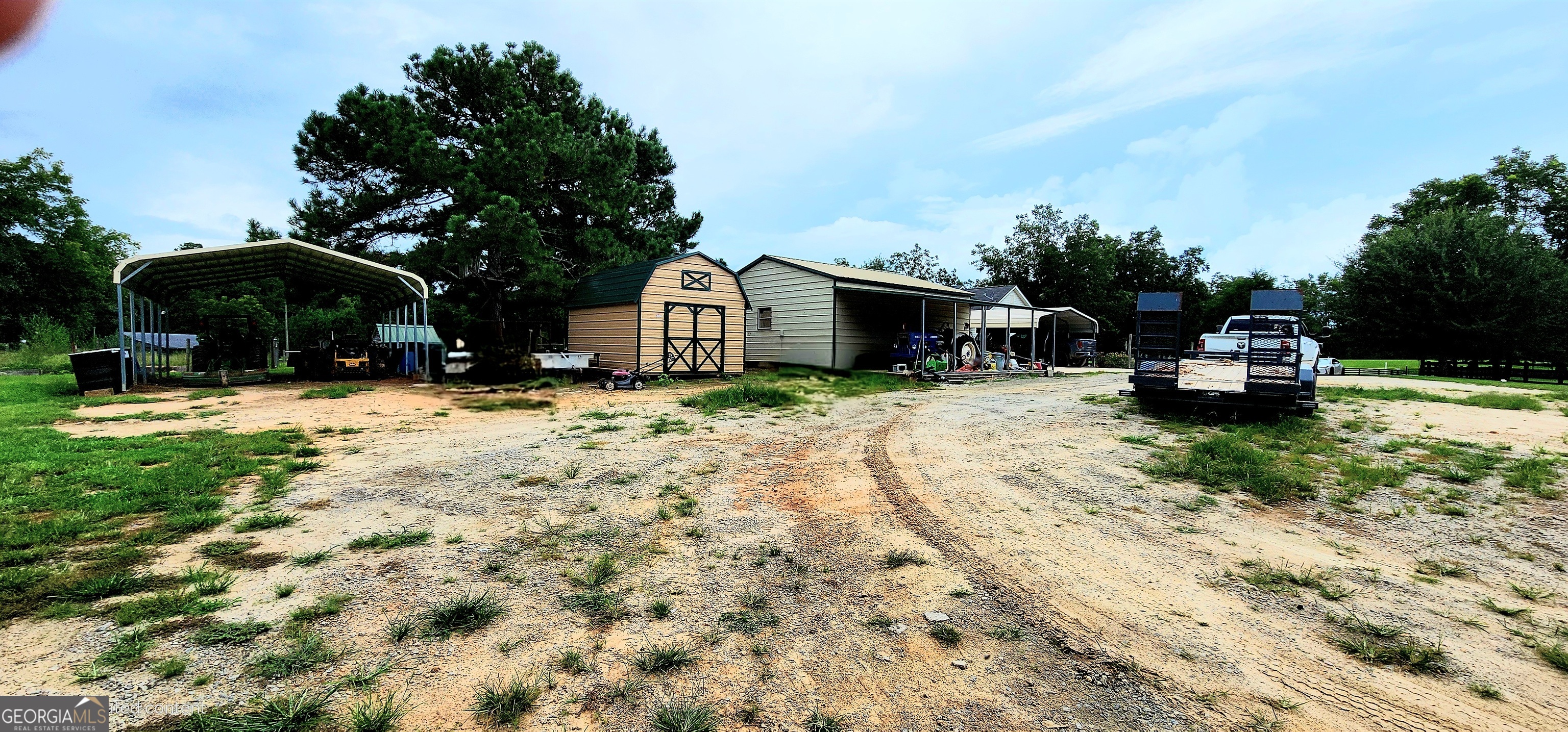 1579 Bates Road Concord, GA 30206 - Photo 8 of 52 a view of a house with a yard covered in snow