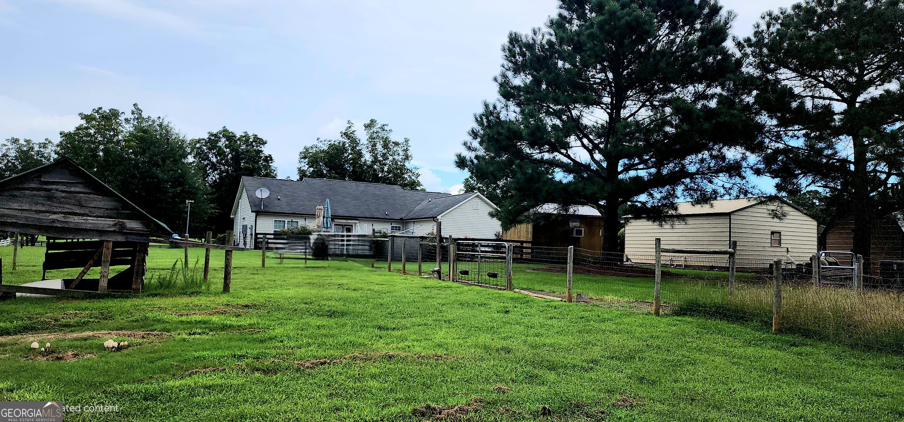 1579 Bates Road Concord, GA 30206 - Photo 9 of 52 a view of a house with a yard