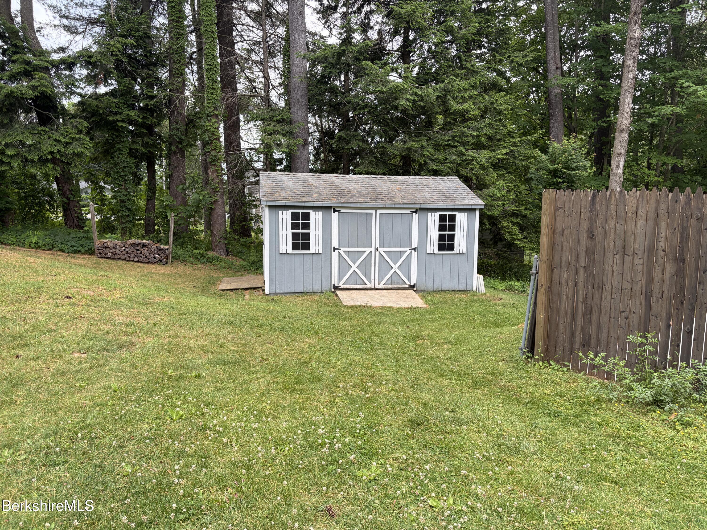 20 Sullivan Lane Lenox, MA 01240 - Photo 23 of 23 front view of a house with a yard