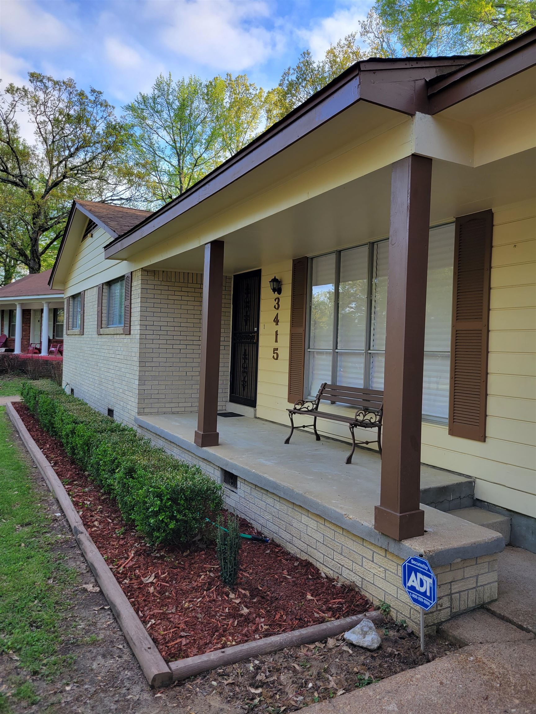 3415 Adrick Road Memphis, TN 38128 - Photo 12 of 22 a front view of a house with garden
