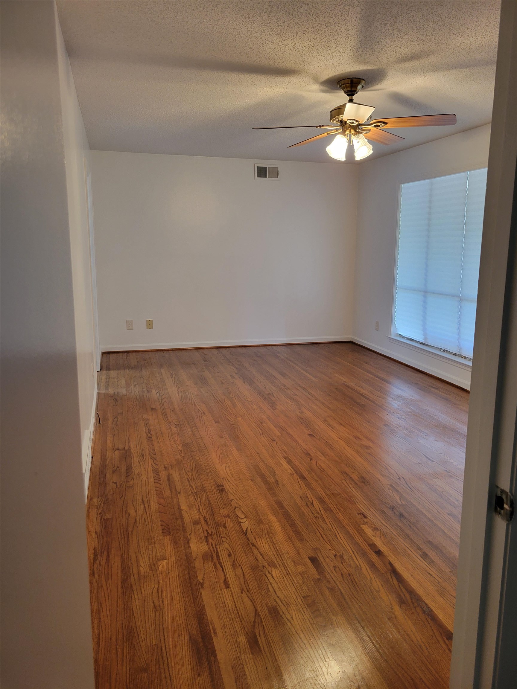 3415 Adrick Road Memphis, TN 38128 - Photo 5 of 22 wooden floor in an empty room