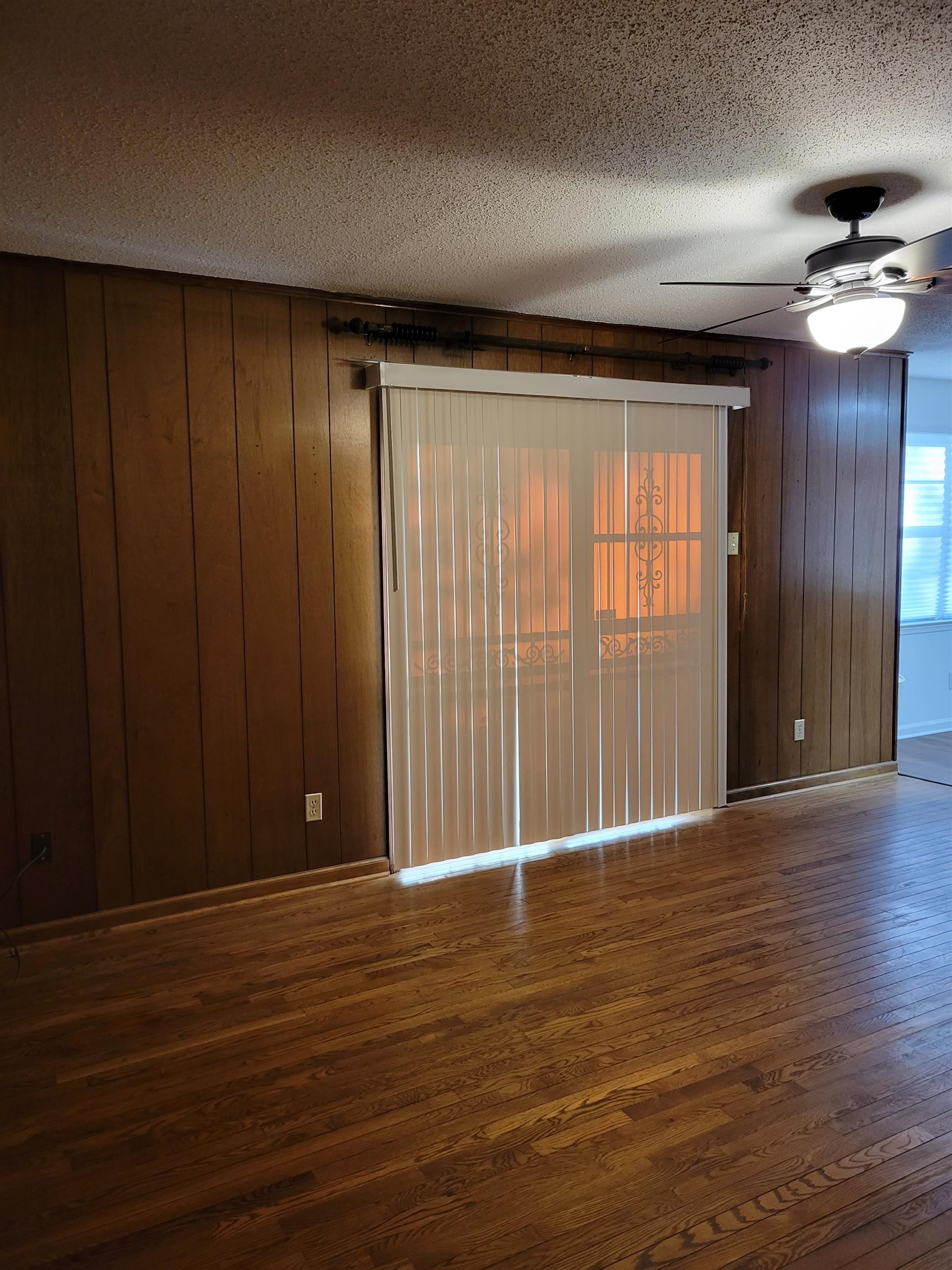 3415 Adrick Road Memphis, TN 38128 - Photo 8 of 22 an empty room with wooden floor