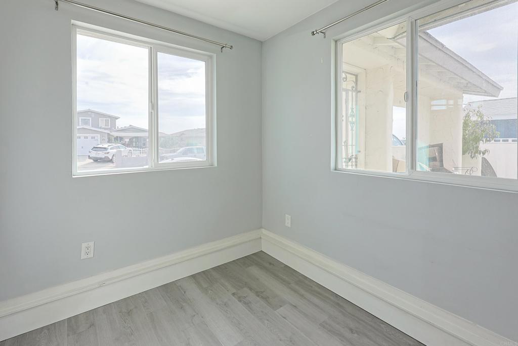3774 Clavelita Street San Diego, CA 92154 - Photo 12 of 18 an empty room with a window