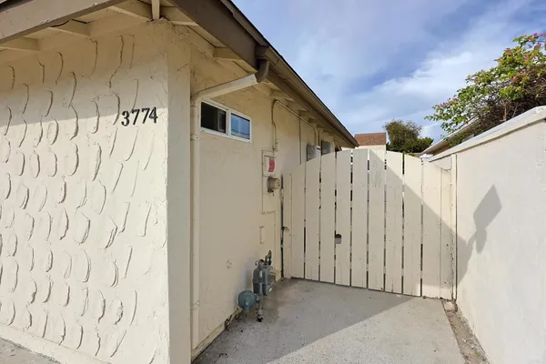 a view of a back yard of the house