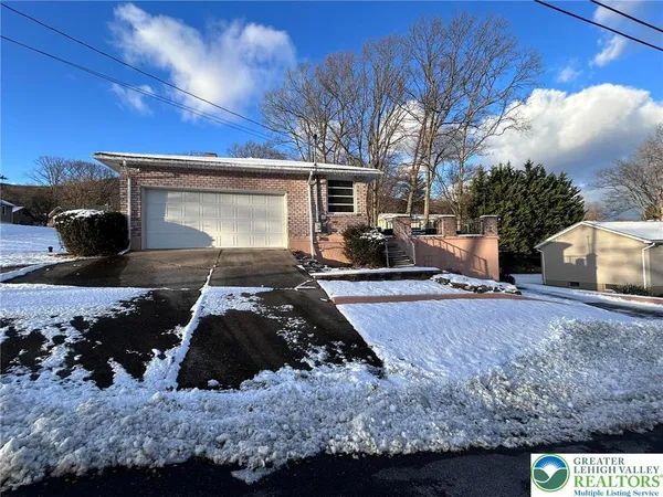 a view of a backyard of a house
