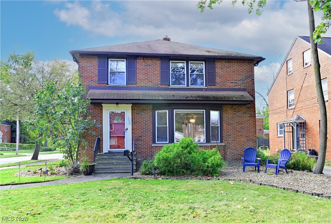 3798 Hillbrook Road Cleveland, OH 44118 - Photo 1 of 34 Front facade featuring a front lawn