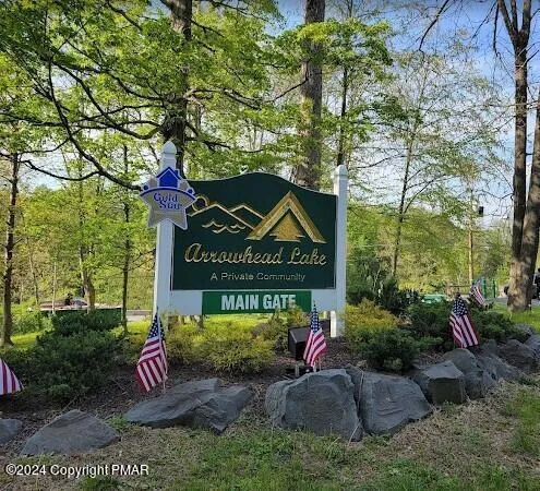 a view of a house with a yard porch and sitting area