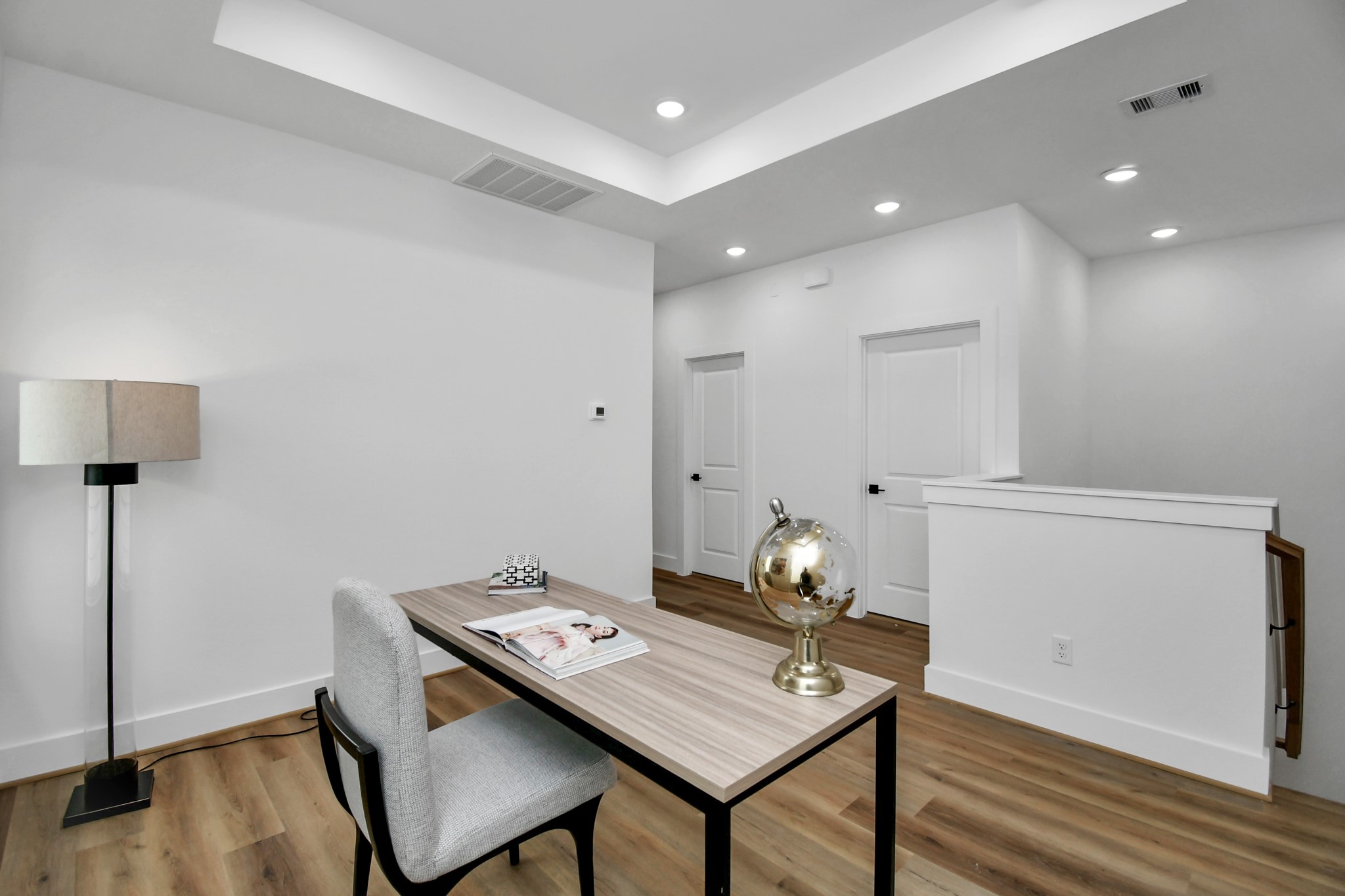 2610 Vance Street Houston, TX 77093 - Photo 14 of 30 a workspace with furniture and wooden floor