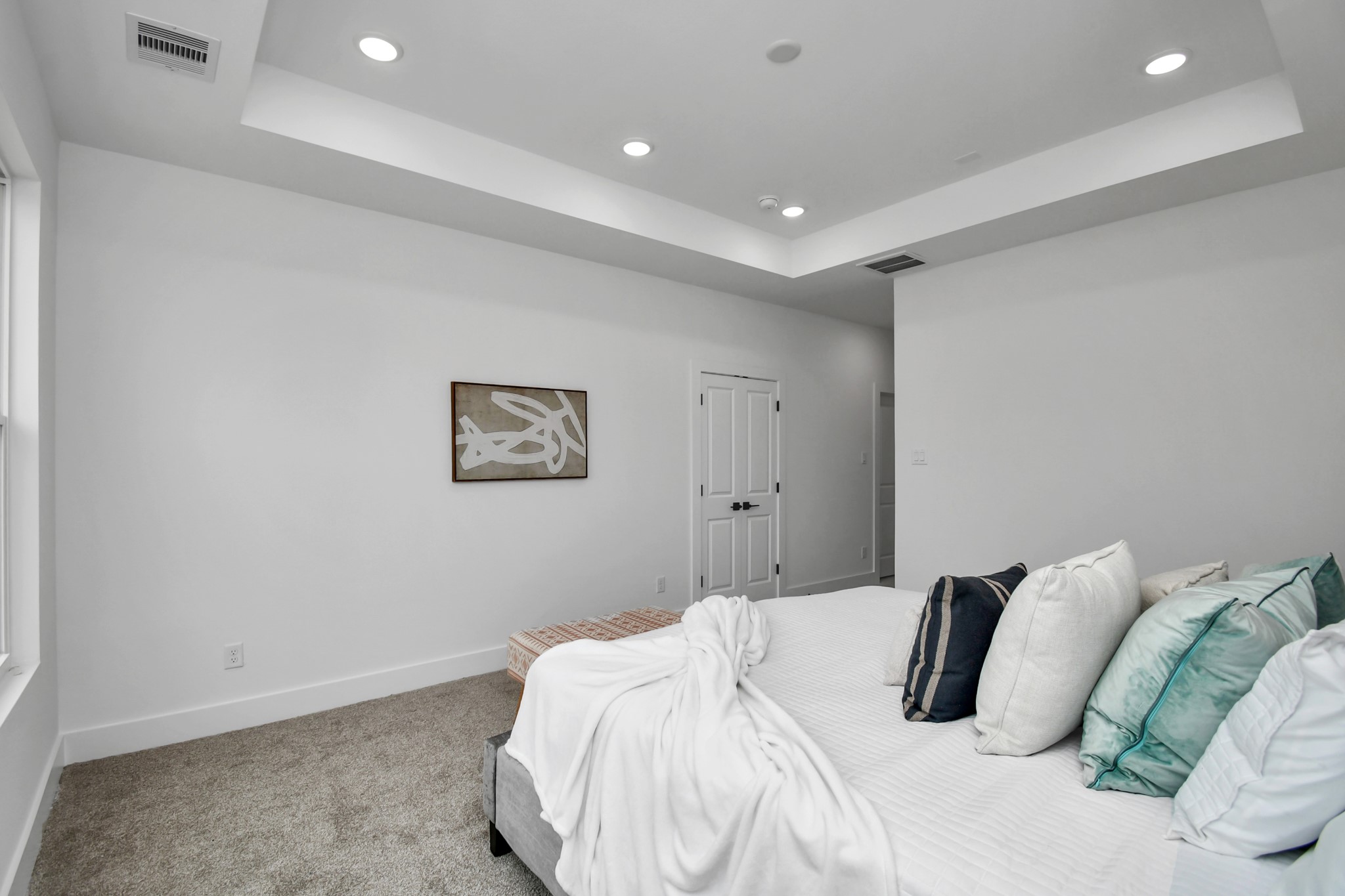 2610 Vance Street Houston, TX 77093 - Photo 17 of 30 a bedroom with a bed and a painting on the wall