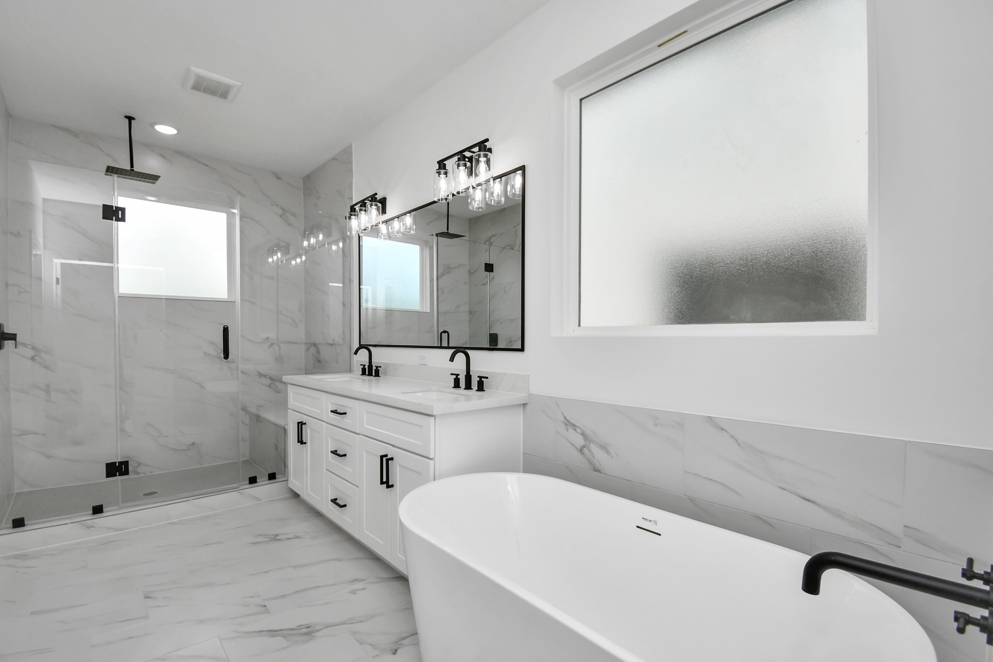 2610 Vance Street Houston, TX 77093 - Photo 18 of 30 a bathroom with a tub sink and mirror