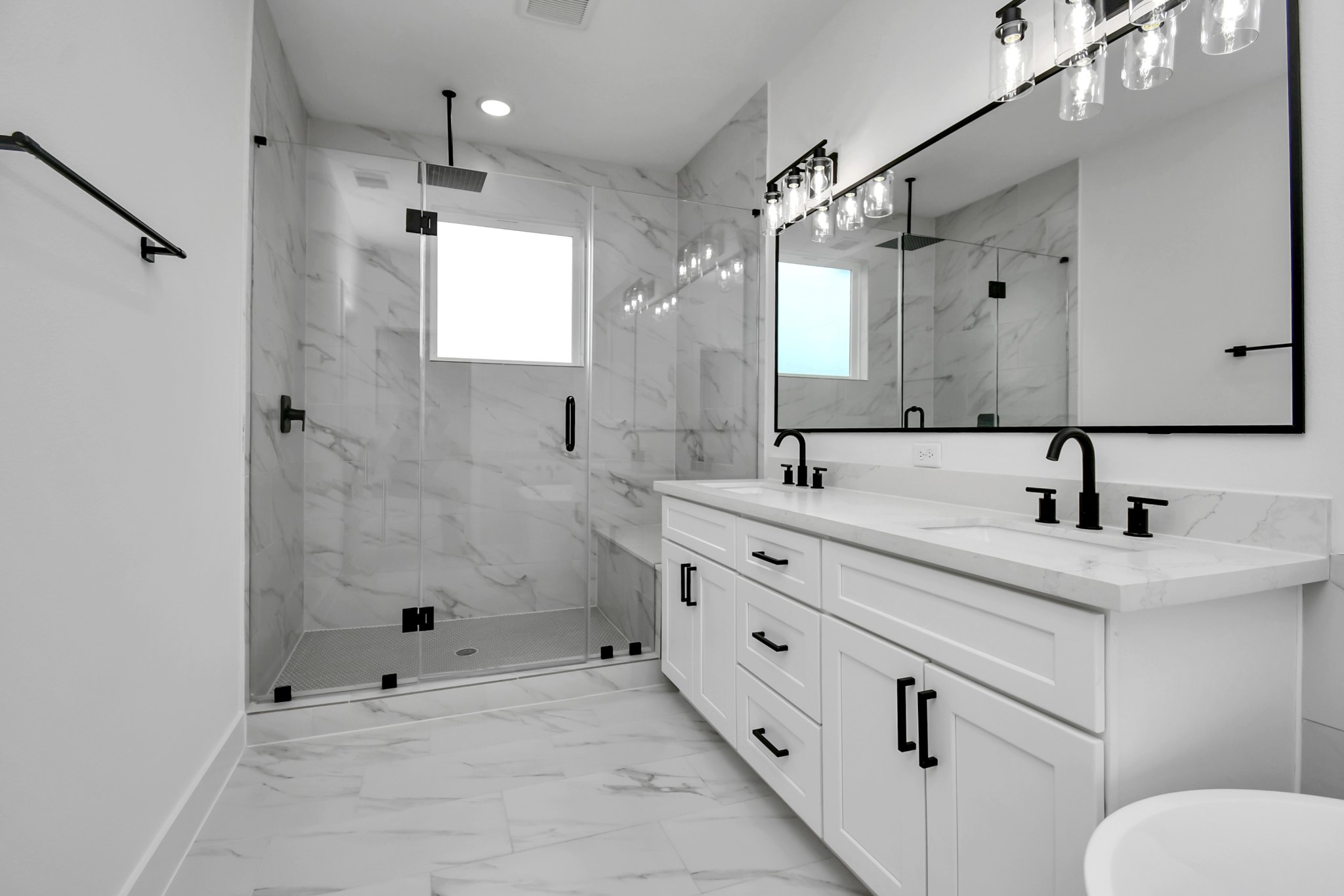 2610 Vance Street Houston, TX 77093 - Photo 19 of 30 a bathroom with double sink and mirror