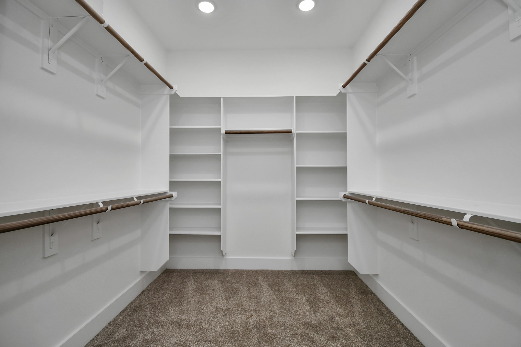 2610 Vance Street Houston, TX 77093 - Photo 20 of 30 a view of walk in closet with empty racks