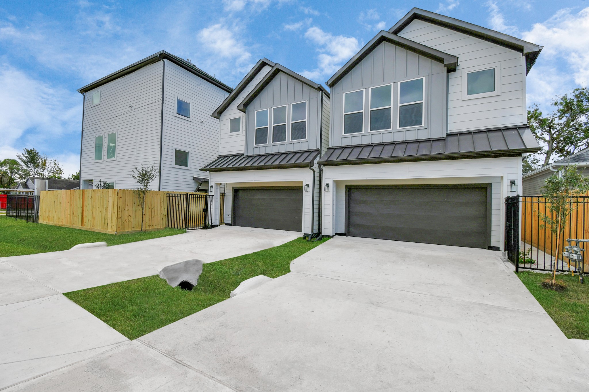 2610 Vance Street Houston, TX 77093 - Photo 2 of 30 a front view of a house with a garden and garage