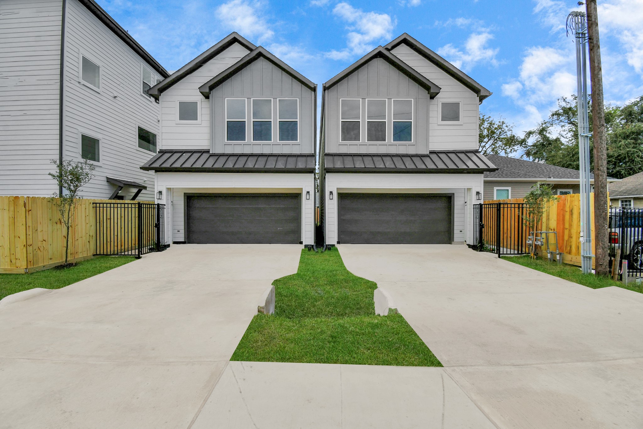 2610 Vance Street Houston, TX 77093 - Photo 3 of 30 a front view of a house with a yard and garage
