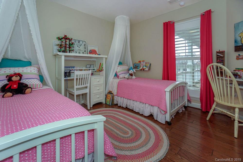 1133 Torrence Circle Davidson, NC 28036 - Photo 12 of 25 a bedroom with a bed and a closet