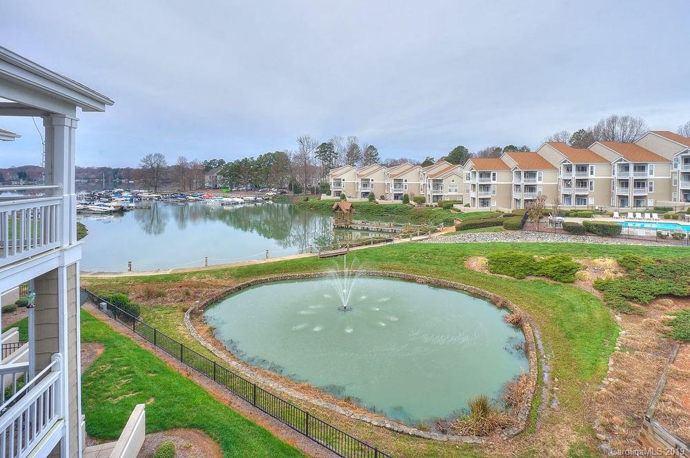1133 Torrence Circle Davidson, NC 28036 - Photo 18 of 25 a view of a swimming pool with a yard