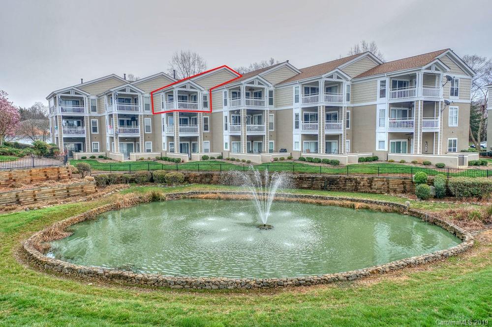 1133 Torrence Circle Davidson, NC 28036 - Photo 20 of 25 a view of a swimming pool and a lot of buildings