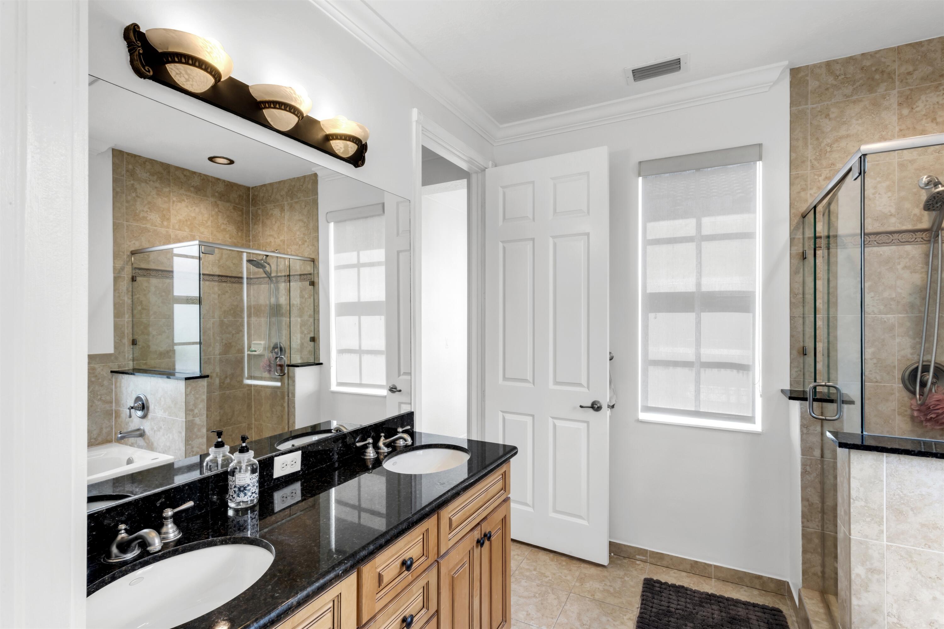 8300 Northwest 9th Avenue Boca Raton, FL 33487 - Photo 17 of 23 PRIMARY_BATHROOM_ANGLE_OUT