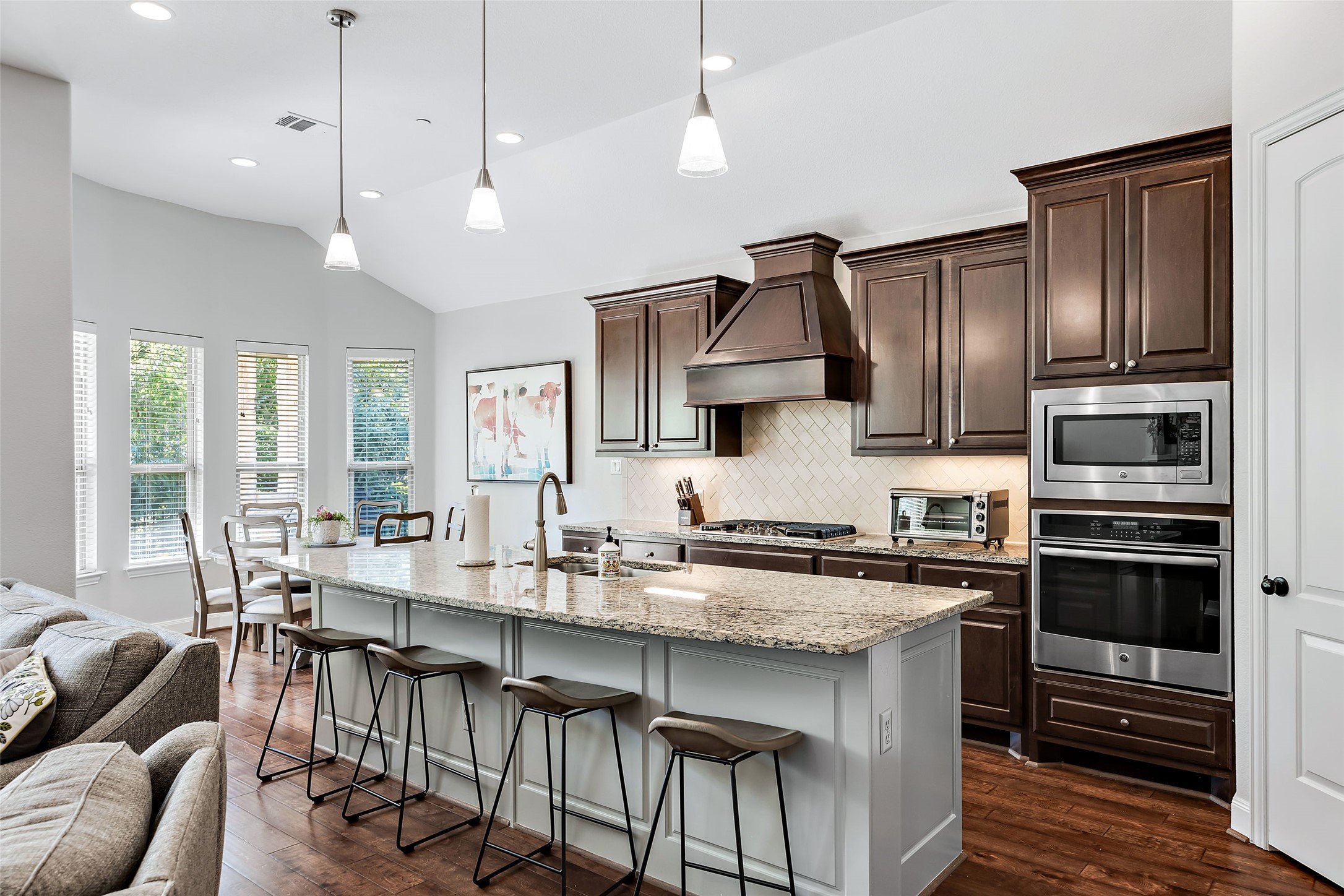 106 Maxwell Way Austin, TX 78738 - Photo 10 of 40 Kitchen with a vaulted ceiling