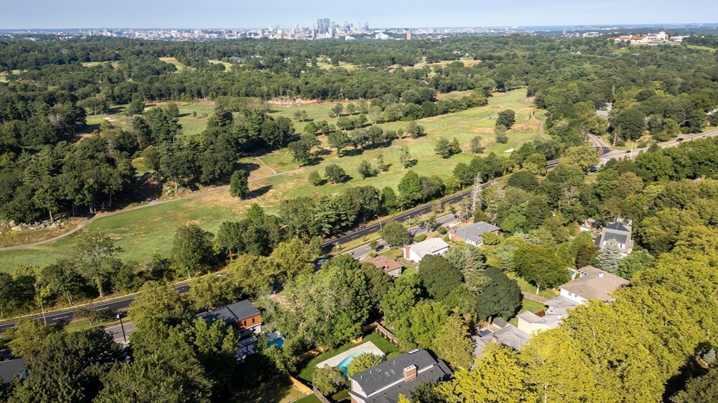 171 Shaw Road Brookline, MA 02467 - Photo 40 of 42 an aerial view of residential houses with outdoor space and trees