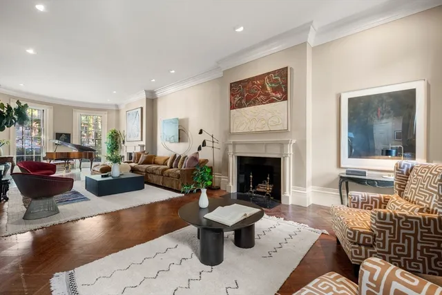 a backyard of a house with outdoor seating