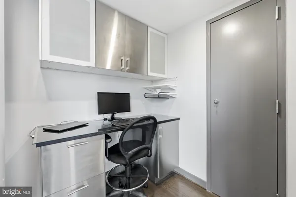 a living room with fireplace furniture and a flat screen tv