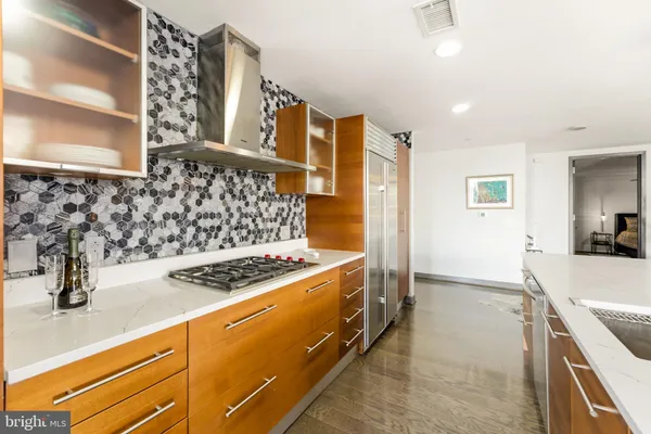 a bedroom with a bed lamp and a window