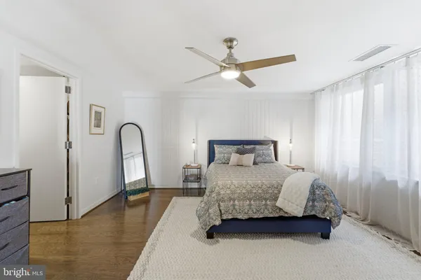 a view of parking garage with cars parked