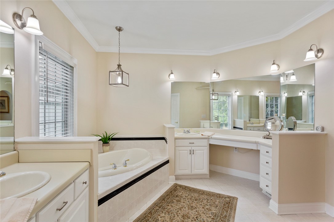 3902 Turnberry Loop Seneca, SC 29678 - Photo 28 of 45 There is a make-up station to the right of the soaker tub!