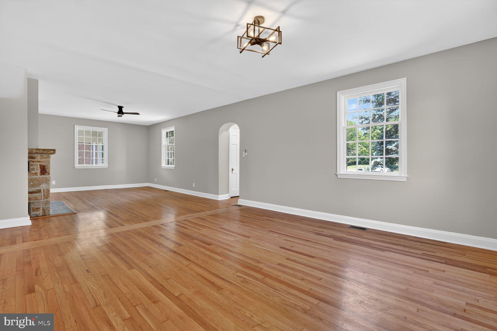 315 East Cold Spring Lane Baltimore, MD 21212 - Photo 21 of 25 wooden floor in an empty room with a window